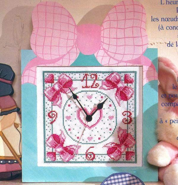 Schema punto croce Orologio Fiocchi Rosa1